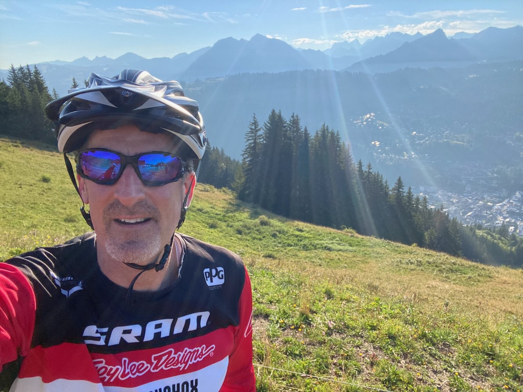 David riding, mountains in the background